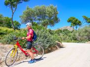 Cyclist on the La Vicoria peninsula in Majorca