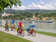 Cyclists on the Danube cycle path Cyclist on cycle path next to the Danube