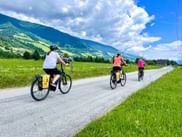 Cyclists in Hollersbach on the Tauern cycle path