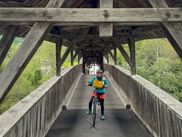 Cyclists on the Urgen Bridge on their way to Lake Garda