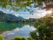 Lake with a view of a village in southern Styria
