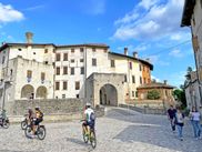 Cyclists at Valvasone Castello