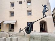 A statue with children in the old town of Vicenza in Italy.