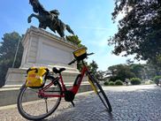 Eurobike e-bike rental in front of equestrian statue