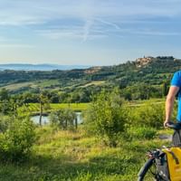 Cyclist enjoys the view of Montepulciano