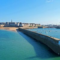 View of the long breakwater of the walled city of St Malo by the sea