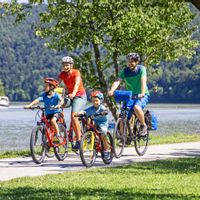 Family on the cycle path on the banks of the Danube
