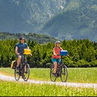Cyclists with view on the mountain Untersberg