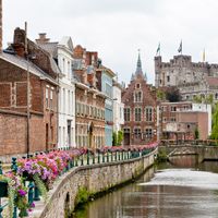 View of brick houses and a castle in Ghent