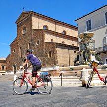 Cyclists at the market place in Faenza