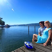 Cyclists take a break in Reichenau on Lake Constance