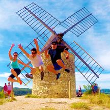 Havin fun in front of a mill in the province Provence