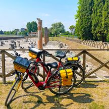 Eurobike bicycle in front of excavations in Aquileia