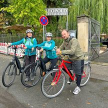 Three cyclists taking a break