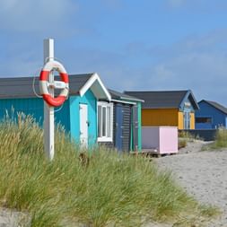 Colourful beach houses on the Fuenen bike tour