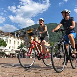 Cyclists in city centre of Bolzano