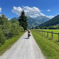 Man rides his bike along the Gasteiner Ache