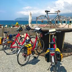 Bicycles in the bike rack on the coast
