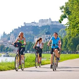Cyclist on the Salzach in Salzburg