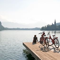 Cyclists taking a break at Lake Bled