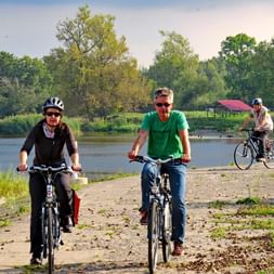 Cyclists on river-cycle path