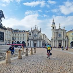 Cyclist in the Piazza San Carlo