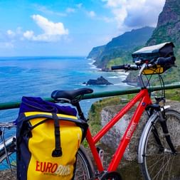 Bike in front of cliffs