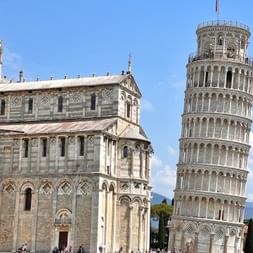 Leaning Tower of Pisa in Tuscany with blue sky