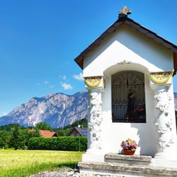 Small chapel with mountain panorama