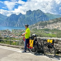 Cyclist with a view at Lake Garda