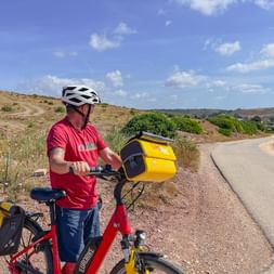 Cyclist with a view of the village
