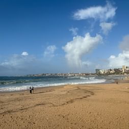 Sandy beach with the sea in the background