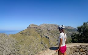 Cyclist enjoys a break at the Entreforc viewpoint
