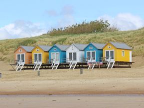 Colourful beach huts in Zeeland