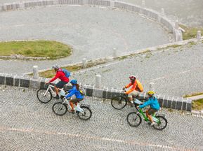 Cyclists on the Gotthard Pass in Switzerland