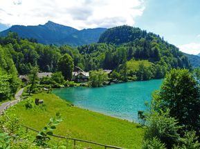 Cycle path at a turquoise-blue lake