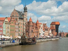At the harbour of the former Hanseatic city of Gdansk with its brick houses