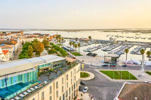 View of the harbour and the Hotel Faro & Beach Club