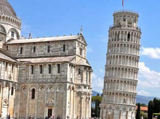 Leaning Tower of Pisa in Tuscany with blue sky