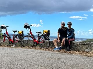 Active holidaymakers on a cycling break in Tuscany