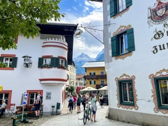 Village square in Lofer with a view of the Loferer Steinberge mountains