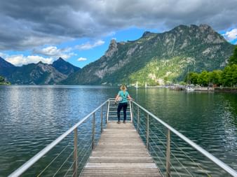 Cyclist on footbridge at Lake Traunsee
