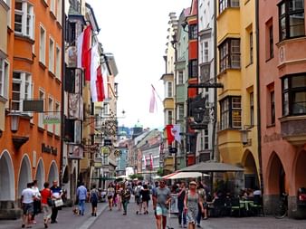 Lively hustle and bustle in the pedestrian street in Innsbruck