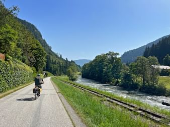 Cyclist on the Mur cycle path near Ramingstein