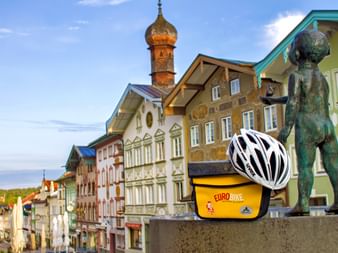 Handlebar bag with Eurobike helmet placed in the pedestrian zone in Bad Tölz