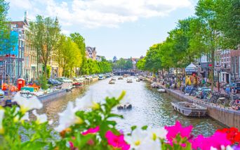 Amsterdam canal with flowers