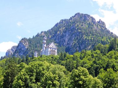 Neuschwanstein Castle with mountain panorama