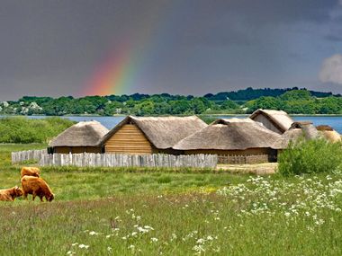 Viking houses with rainbow in the background