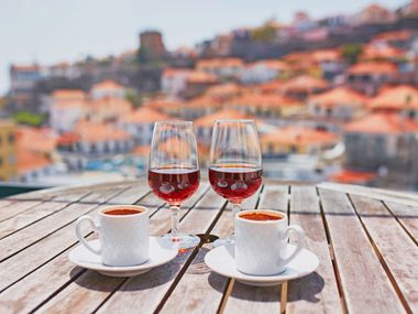 Enjoy Madeira wine and coffee on a terrace in Funchal