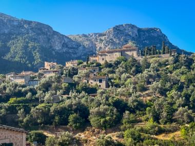 View of Deia with mountains in the background